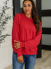 Sweet with a Side Eye Drop Shoulder Pullover in True Red